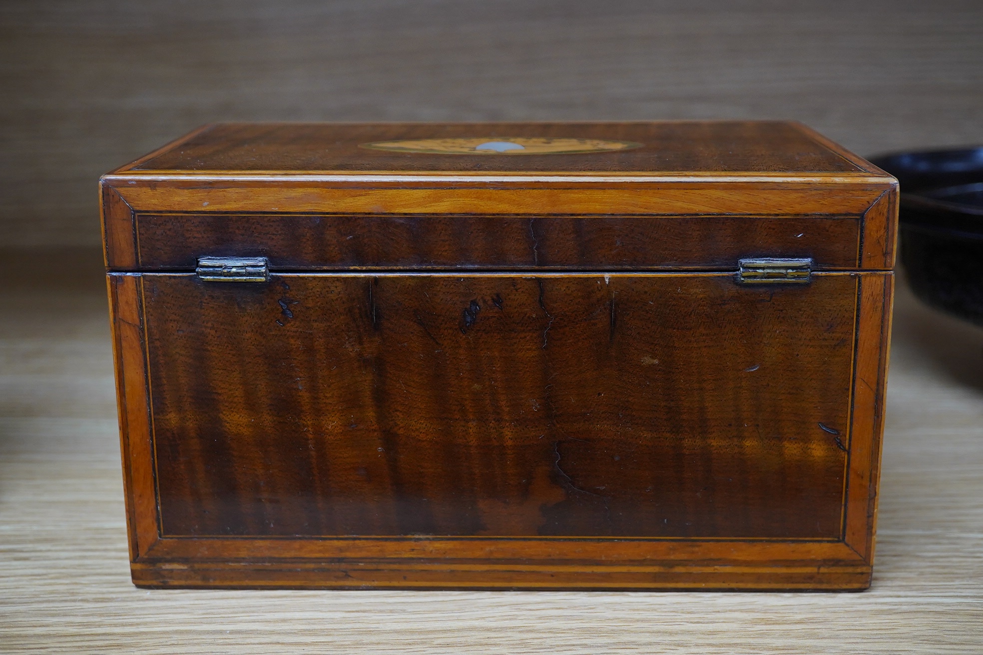 A George III inlaid tea caddy, 20cm x 11cm x 11.5cm. Condition - fair, some internal damage